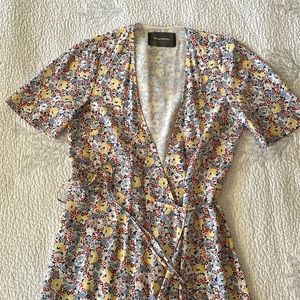Reformation midi-length floral silk wrap dress.